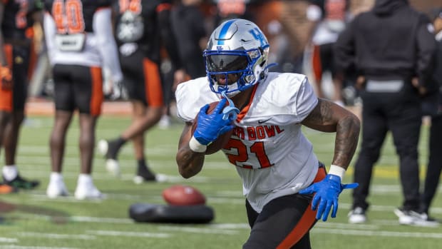 Feb 1, 2024; Mobile, AL, USA; American running back Ray Davis of Kentucky (21) works in running drills during practice for the American team at Hancock Whitney Stadium.